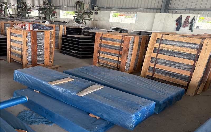 Mixed container of granite headstones packed for export from India to USA